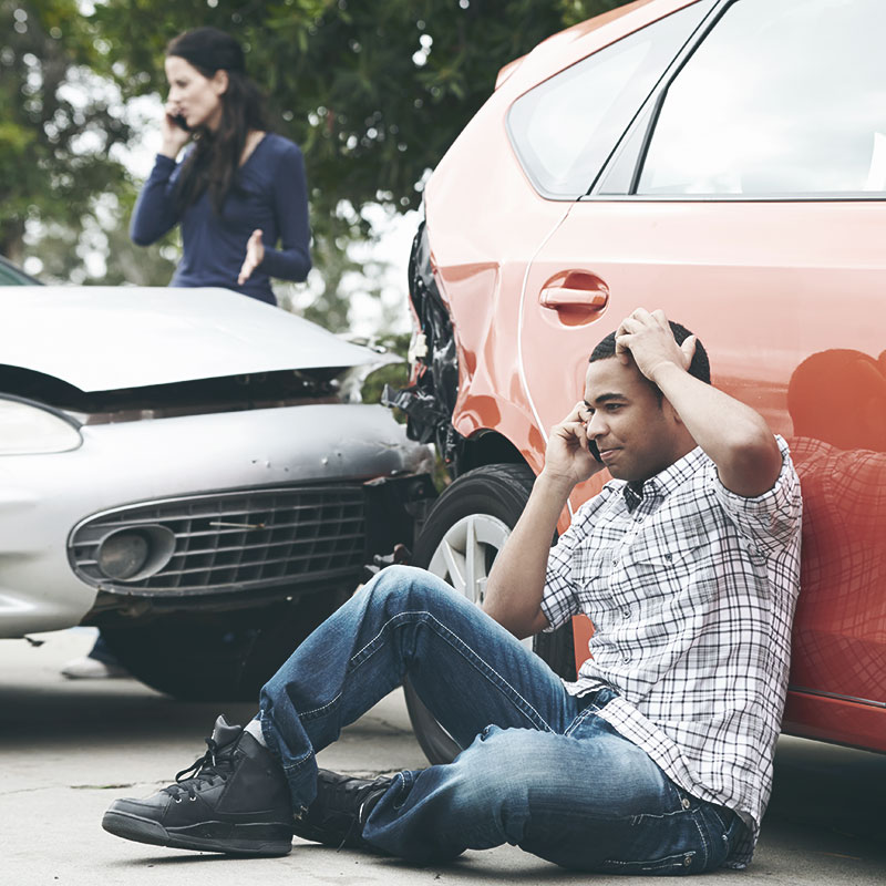 A man on the phone after an accident