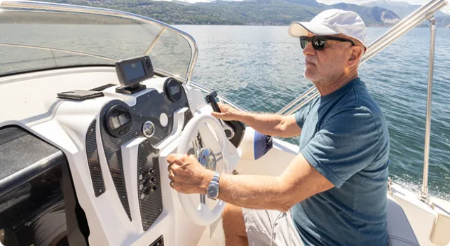 Man driving a boat